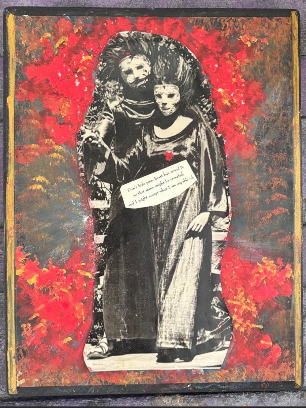 Romantic handmade newspaper clipping collage on a painted wood slab